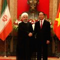Iranian President Hassan Rouhani (L) met with Vietnamese President Tran Dai Quang in Hanoi in October 2016. (File Photo)