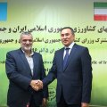 Iran’s Minister of Agriculture Mahmoud Hojjati (L) shakes hands with Kazakhstan’s Deputy Prime Minister and Minister of Agriculture Askar Myrzakhmetov in Tehran on Sunday.