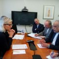 Massoud Karbasian (1st R) siting across Denmark’s Minister for Development Cooperation Ulla Tørnæs  during a meeting in Washington, DC. 