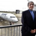 Iran Air CEO Farhad Parvaresh poses with the first Airbus A321 recently delivered to Iran.