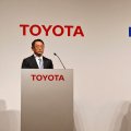 Toyota Chief Akio Toyoda (L) and Panasonic CEO Kazuhiro Tsuga attend a news conference in Tokyo on Wednesday.