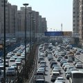 One of Tehran’s clogged streets. Mohsen Hashemi Rafsanjani (inset).