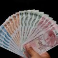 Lira Eases Against Dollar