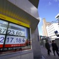 An electronic stock indicator of a securities firm in Tokyo on Thursday