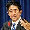 Abe Sticks to Tax Hike Plan