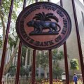 RBI Keeps Rate Unchanged, Downgrades Growth Forecast