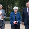 Bank of Japan Gov. Haruhiko Kuroda (L), Federal Reserve chief Janet Yellen (C) and ECB’s Mario Draghi, walk the grounds at the Jackson Hole economic symposium in Moran, Wyoming in July.