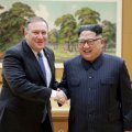 Kim Jong-un (R) receives Mike Pompeo in Pyong Yang on May 9.