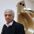 Parviz Tanavoli and one of his sculptures