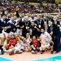 Iran players and coaching team celebrate after the victory