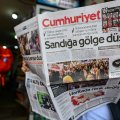 The Cumhuriyet opposition newspaper ran a headline focused on alleged vote violations: “A shadow fell over the ballot boxes”
