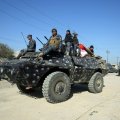 Iraqi security forces advance toward the village of al-Buseif on February 21, during their offensive to retake western Mosul.