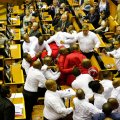 Security officials clashed with members of Economic Freedom Fighters during Zuma’s State of the Nation address on Feb. 9.