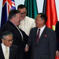 US Secretary of State Mike Pompeo shakes hands with North Korea’s Foreign Minister Ri Yong Ho as South Korea’s Foreign Minister Kang Kyung-wha looks on at the ASEAN meeting in Singapore on August 4.
