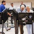 Voters cast their ballots among an array of electronic voting machines in a polling station at the Noor Islamic Cultural Center  in Dublin, Ohio, on August 7. 