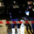 Police investigators work on the scene after seven people were wounded in knife attack downtown Paris, on Sept. 9.