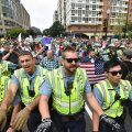 Police escort far-right demonstrators during a rally at Lafayette Park  opposite the White House, on August 12.