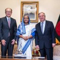 Prime Minister of Bangladesh Sheikh Hasina flanked by UN Secretary-General Antonio Guterres (R) and World Bank Group President Jim Yong Kim in Dhaka, Bangladesh on July 1