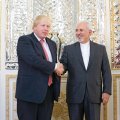 British Foreign Secretary Boris Johnson (L) meets Foreign Minister Mohammad Javad Zarif in Tehran on Dec. 9.