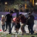 People carry a peson at the Route 91 Harvest country music festival after gun fire in Las Vegas, Nevada. (Photo: AFP)